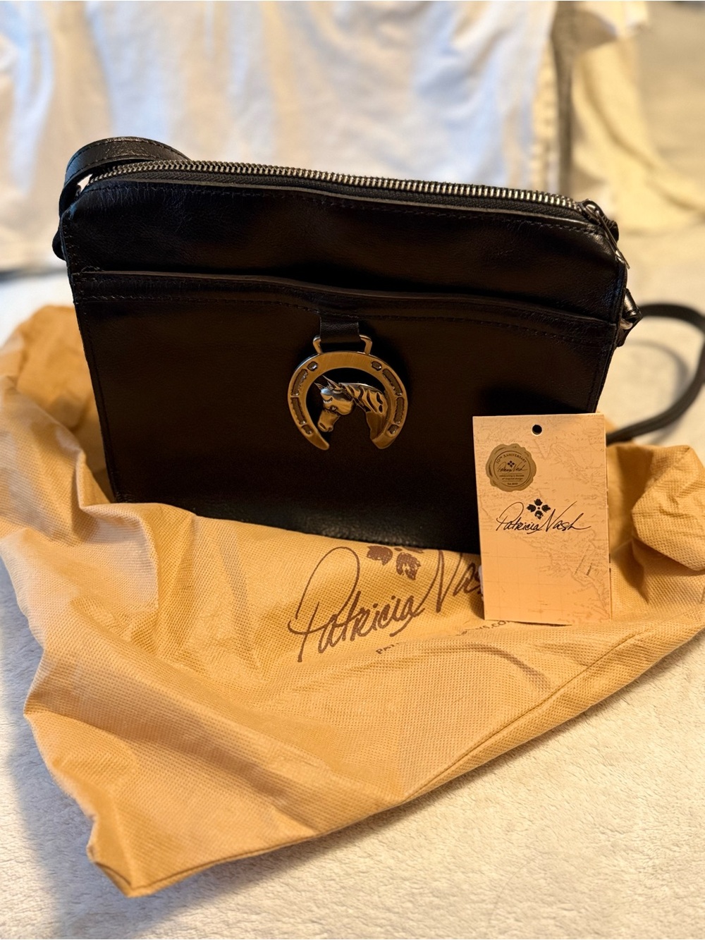 Patricia Nash Black Leather Crossbody with silver horseshoe